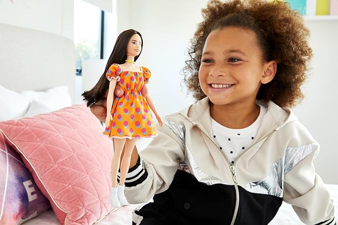 Barbie Fashionistas Doll #160 with Long Brunette Hair Wearing Patterned Orange Dress, White Shoes & Yellow Choker, Toy for Kids 3 to 8 Years Old