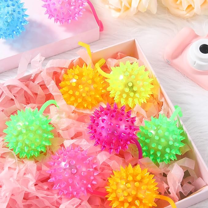 Sotiff 150 Pcs Light up Ball Spiky LED Bouncy Ball Flashing Squeaky Multicolor Puffer Toy Rubber Sensory Toy Carnival Prizes Bulk Party Favors for Teens, Adults, Children
