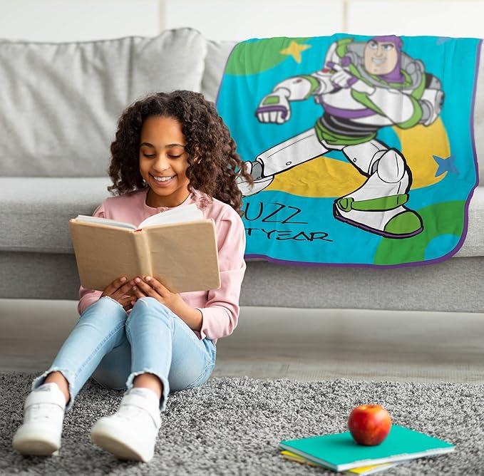 Jay Franco Plush Throw Blanket – 46" x 60" Inch Kids Soft & Cozy Fleece Throw for Bedroom & Couch Décor, Official Licensed Product, Blue - Toy Story Buzz