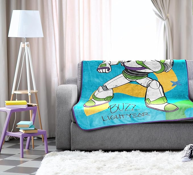 Jay Franco Plush Throw Blanket – 46" x 60" Inch Kids Soft & Cozy Fleece Throw for Bedroom & Couch Décor, Official Licensed Product, Blue - Toy Story Buzz