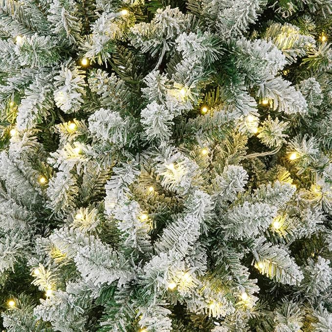 Glitzhome 11ft Prelit Artificial Christmas Tree, Snowy Splendor Fir Hinged Pencil Christmas Tree Holiday Decoration with 950 Warm White Lights and Foldable Metal Stand, Easy Assembly