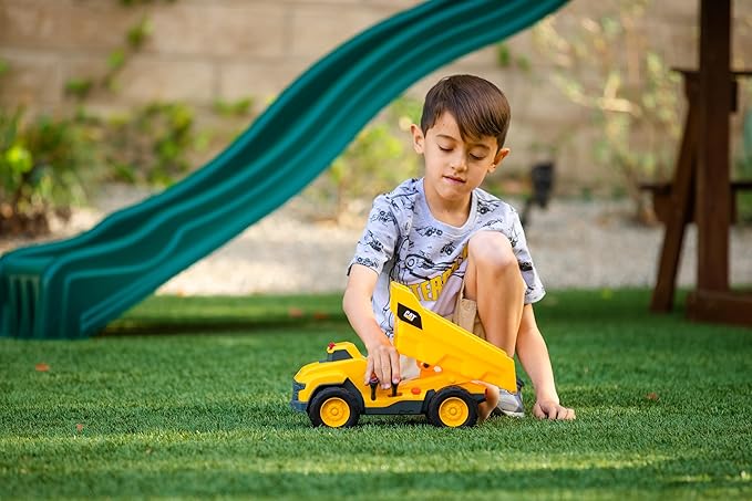 CAT Construction Toys, Motorized Dump Truck Toy, 6 Unique Sounds, 2 Motorized Functions, Lights & Sounds, Includes 3 AA Batteries.